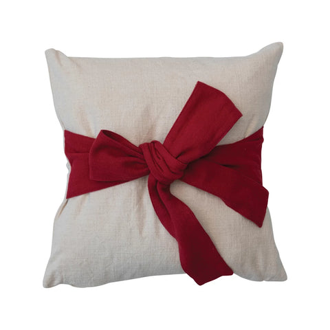 Hand woven pillow with bow